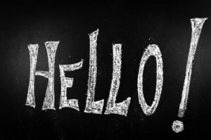 Hello written on a black chalkboard