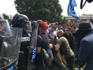 Image Credit: Evan Nesterak, CC BY 2.0 (Image Source: License: https://commons.wikimedia.org/wiki/File:White_supremacists_clash_with_police_(36421659232).jpghttps://creativecommons.org/licenses/by/2.0/deed.en)